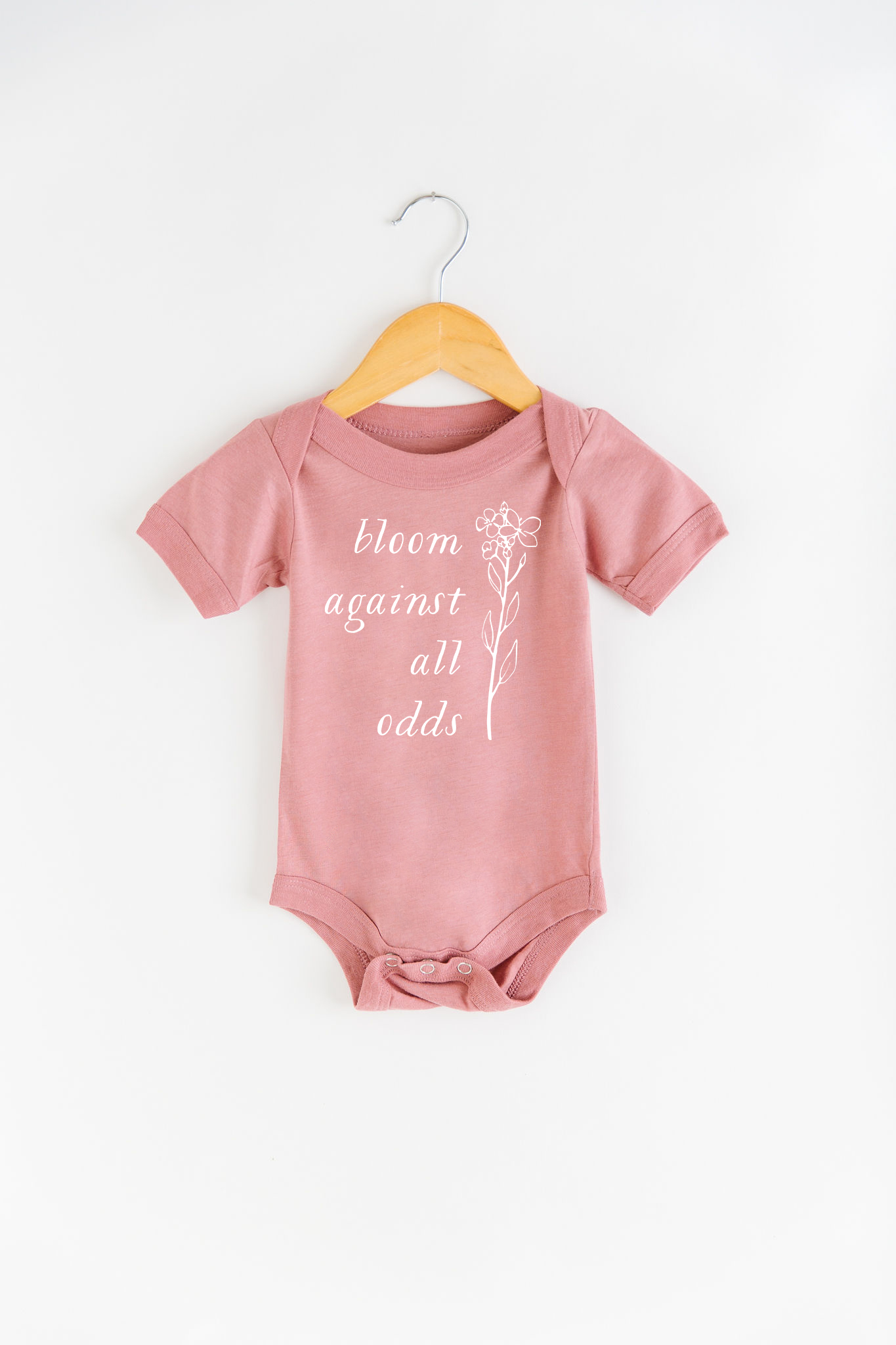 Bloom Against All Odds Onesie
