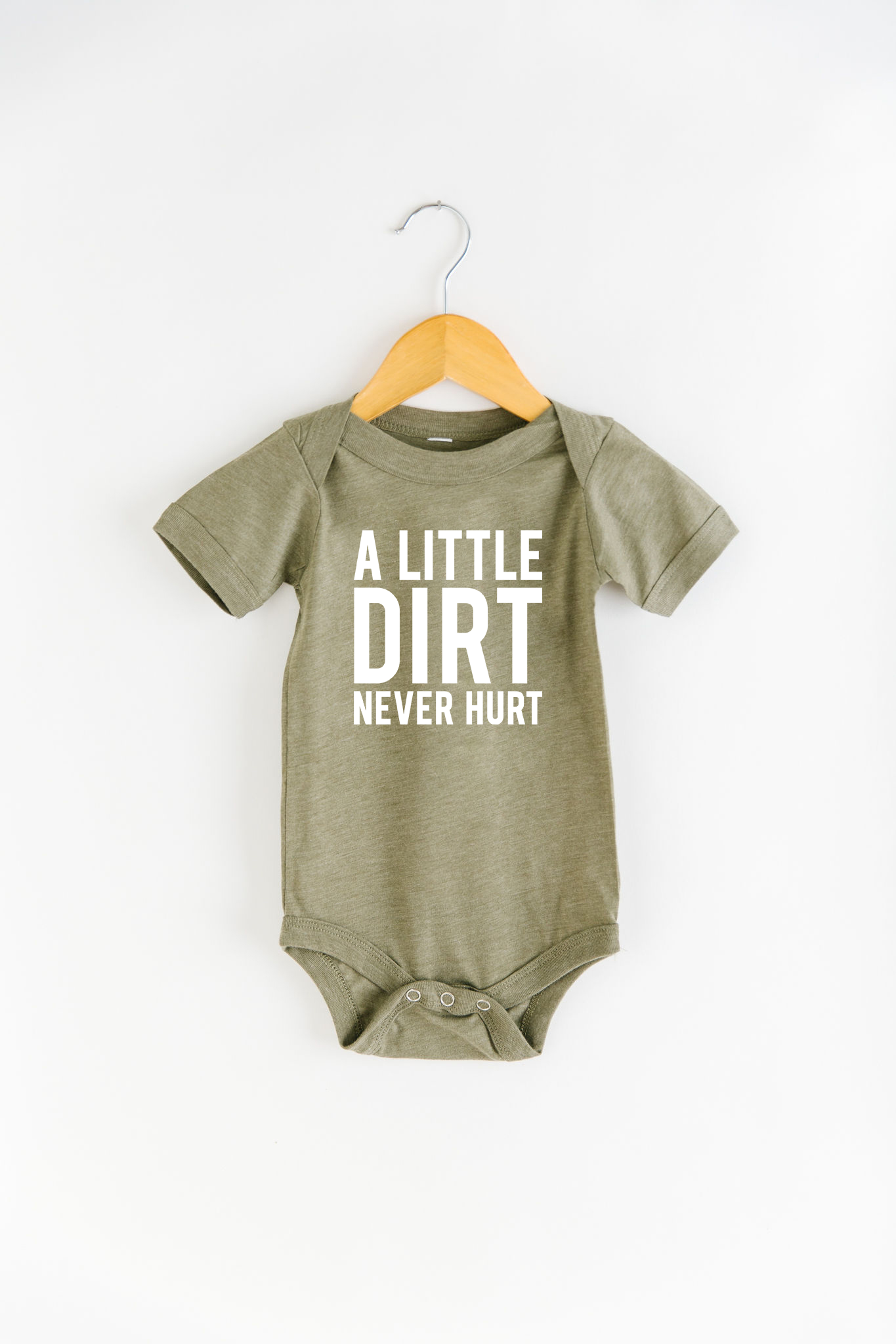 Dirt Never Hurt Onesie